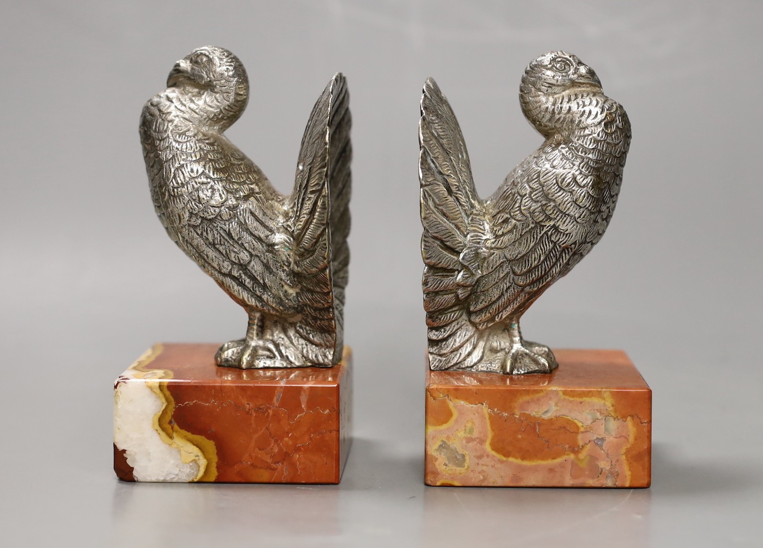 A pair of Art Deco silvered bronze 'turkey' bookends. 13cm high
